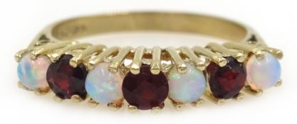 Opal and garnet gold ring, hallmarked 9ct Condition Report Size M, approx 2.