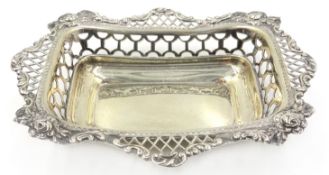 Victorian silver dish with pierced and embossed flower decoration by William Comyns & Sons,