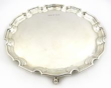 Silver waiter with pie crust border and three scroll feet by Gladwin Ltd, Sheffield 1967, W20.