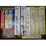 Twelve unmade aeroplane construction kits by Heller, Tamiya and Eduard, including F-5E Tiger,