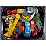 Nineteen unboxed and playworn Dinky die-cast models including two car transporters, three tractors,