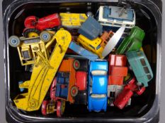 Nineteen unboxed and playworn Dinky die-cast models including two car transporters, three tractors,