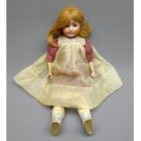 Schoenau and Hoffmeister bisque head doll with applied hair, sleeping eyes,