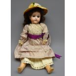 Armand Marseille bisque head doll with applied hair, fixed eyes,