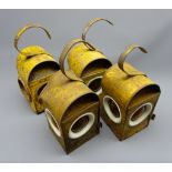 Two Raylor and two other yellow painted metal Road Works lamps,