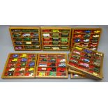 Set of eight wall hanging hardwood display cases for die-cast models each with glazed door