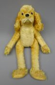 Steiff plush covered five joint long legged Spaniel,