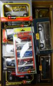 Collection of Burago 1/24 die-cast model cars including Freelander, Bugatti Atlantic, Jaguar XK 120,