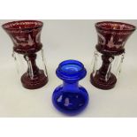 Pair Bohemian ruby glass lustres etched with stags amongst scrolls with faceted glass drops,