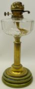 Victorian brass oil lamp with reeded stem,