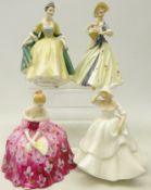 Three Royal Doulton figures 'Victoria',