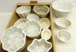 Group of twelve 19th century and later ceramic jelly moulds including Copeland,