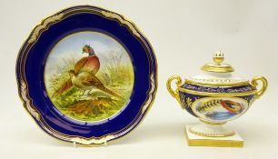 Royal Worcester two handled urn shaped vase and cover having two oval panels decorated with