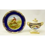 Royal Worcester two handled urn shaped vase and cover having two oval panels decorated with