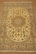 Nain ivory fine ground rug, central medallion,