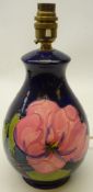 Moorcroft Magnolia pattern table lamp of baluster form,