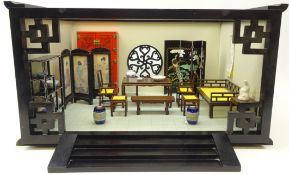 Table top diorama depicting a traditional Japanese interior with furnishings including two folding