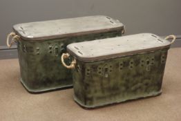 Two graduating industrial style metal and wood travelling trunks with rope handles,