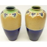 Pair Royal Doulton stoneware vases of baluster form with half glazed body and chine ware decoration