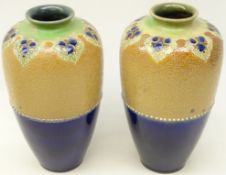 Pair Royal Doulton stoneware vases of baluster form with half glazed body and chine ware decoration