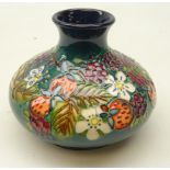 Moorcroft Carousel pattern squat vase on green ground no.