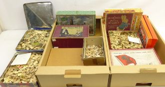 Collection of early 20th century and later plywood jigsaw puzzles including Zigzag Puzzle, Cunard,