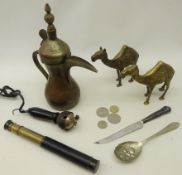 Two brass camels engraved with three wise men nativity scenes,