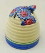 Clarice Cliff 'Marguerite' beehive shaped honey pot and cover, printed and painted marks,