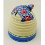 Clarice Cliff 'Marguerite' beehive shaped honey pot and cover, printed and painted marks,