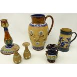 Doulton Lambeth stoneware pottery comprising a pitcher the body having coiled decoration with