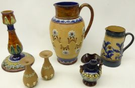 Doulton Lambeth stoneware pottery comprising a pitcher the body having coiled decoration with