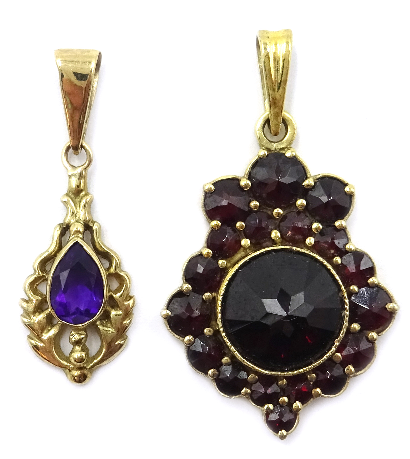 Continental gold garnet pendant,