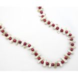 Red and white pearl necklace,