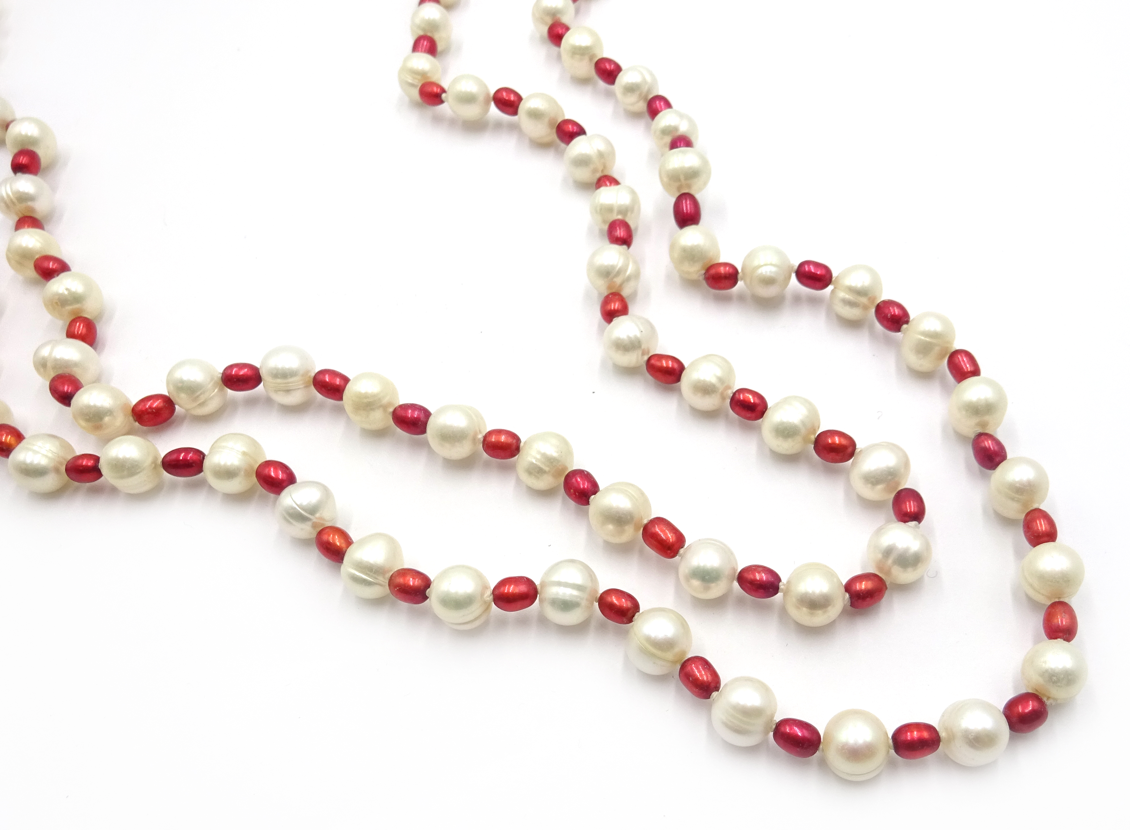 Long red and white freshwater pearl necklace,