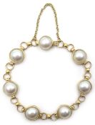 9ct gold circular link pearl bracelet, hallmarked Condition Report Approx 16.