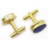 Pair of silver-gilt oval lapis lazuli cufflinks,