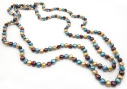 Long blue, brown and champagne colour pearl necklace, with silver clasp stamped 925,