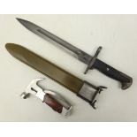 Bayonet in metal and plastic scabbard , the blade marked 'U.S.