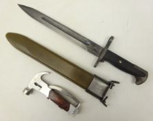 Bayonet in metal and plastic scabbard , the blade marked 'U.S.