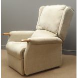 Electric reclining armchair, upholstered in beige fabric,