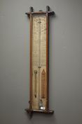 Early 20th century Admiral Fitzroy's barometer with printed register in oak case,