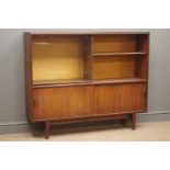 Mid to late 20th century teak bookcase with sliding glass door, adjustable shelves,