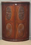 Edwardian mahogany cylinder front corner cupboard, projecting cornice,