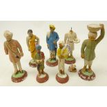 Group of seven early 20th century Indian painted clay & plaster figures,