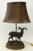 Bronzed table lamp mounted with Stag on rocky oval vase with leather shade,