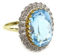 9ct gold blue topaz and diamond cluster ring,