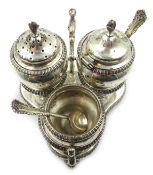 Late Victorian three piece silver cruet with matching spoons and trefoil stand by Goldsmiths &