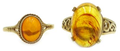 Two 9ct gold Baltic amber rings hallmarked Condition Report small size P large size