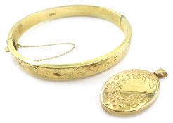 Gold hinged bangle and a hinged locket,