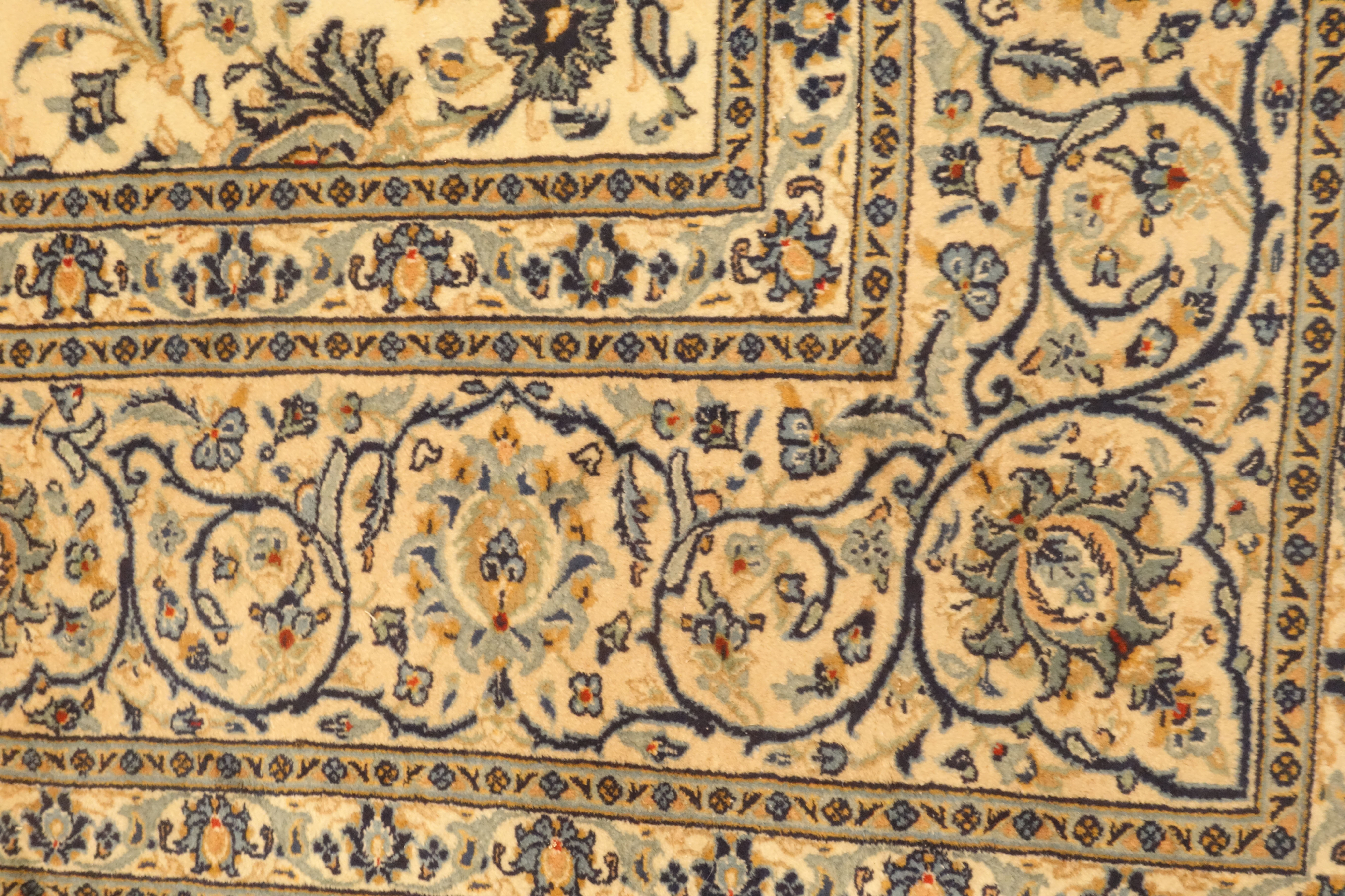 Persian Kashan carpet, ivory ground with blue interlacing overall design, repeating scroll border, - Image 2 of 4